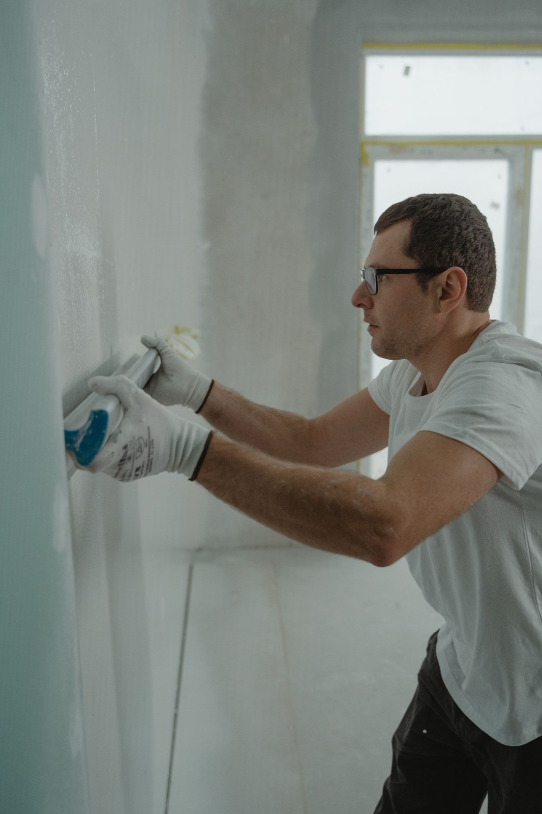 Interior painting and drywall finishing in progress